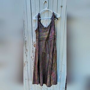 Knit dress with asymmetrical seams and hem